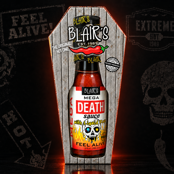 A 150m bottle of Blair's Mega Death Sauce in  a coffin-shaped box on a dark background. Available to buy in Australia.